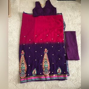 Saree with sleeveless blouse and petty coat